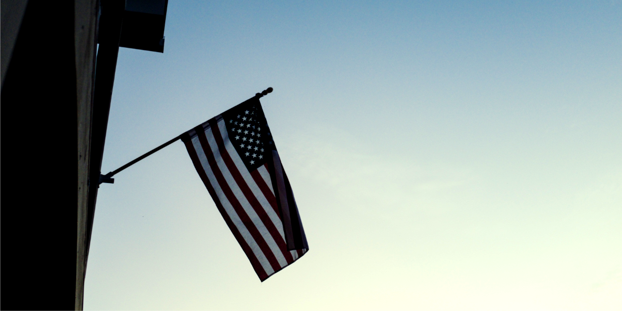 US flag hanging on a building